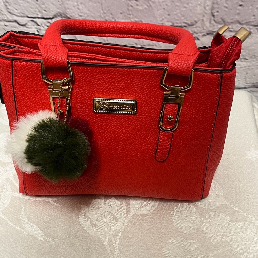 Chic Red Satchel with Pom Pom by [Brand]